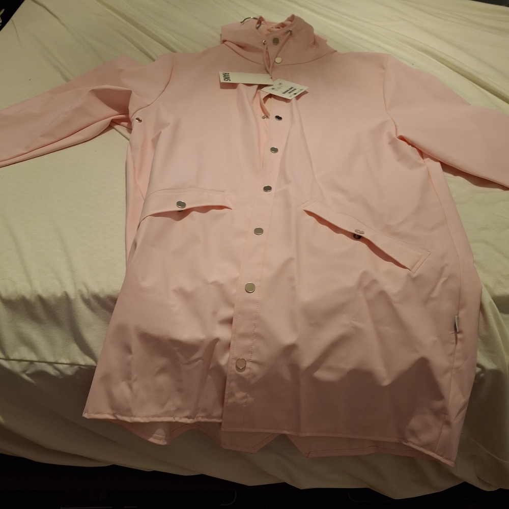 pink hooded rain coat
